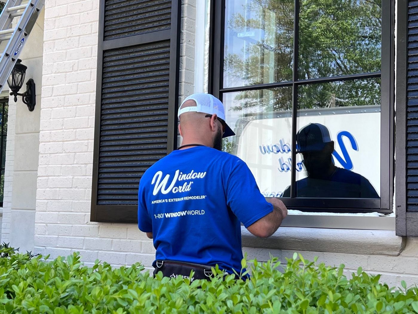 Window World Detroit installing a new window in Farmington